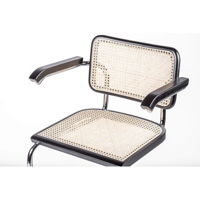 Replica of the Cesca Chair with armrests by designer Marcel Breuer